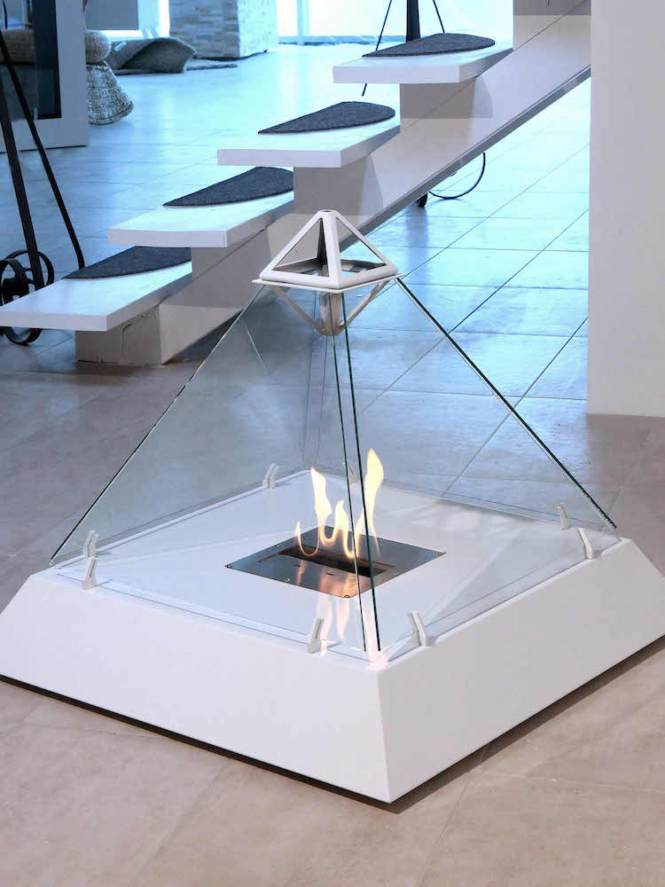 Modern Fireplace Mimics Louvre's Iconic Pyramid