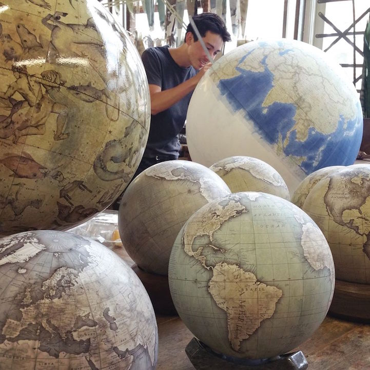 Man Making Globes