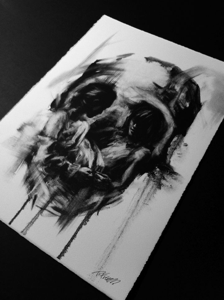 charcoal drawing of skulls