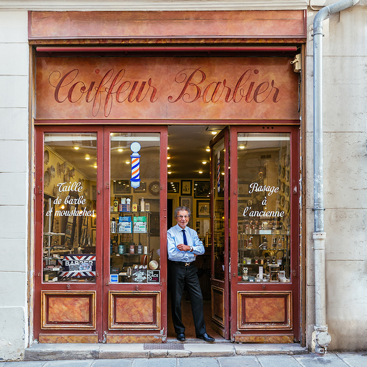 Hand Painted Signage And Refined Woodwork In Parisian Storefront
